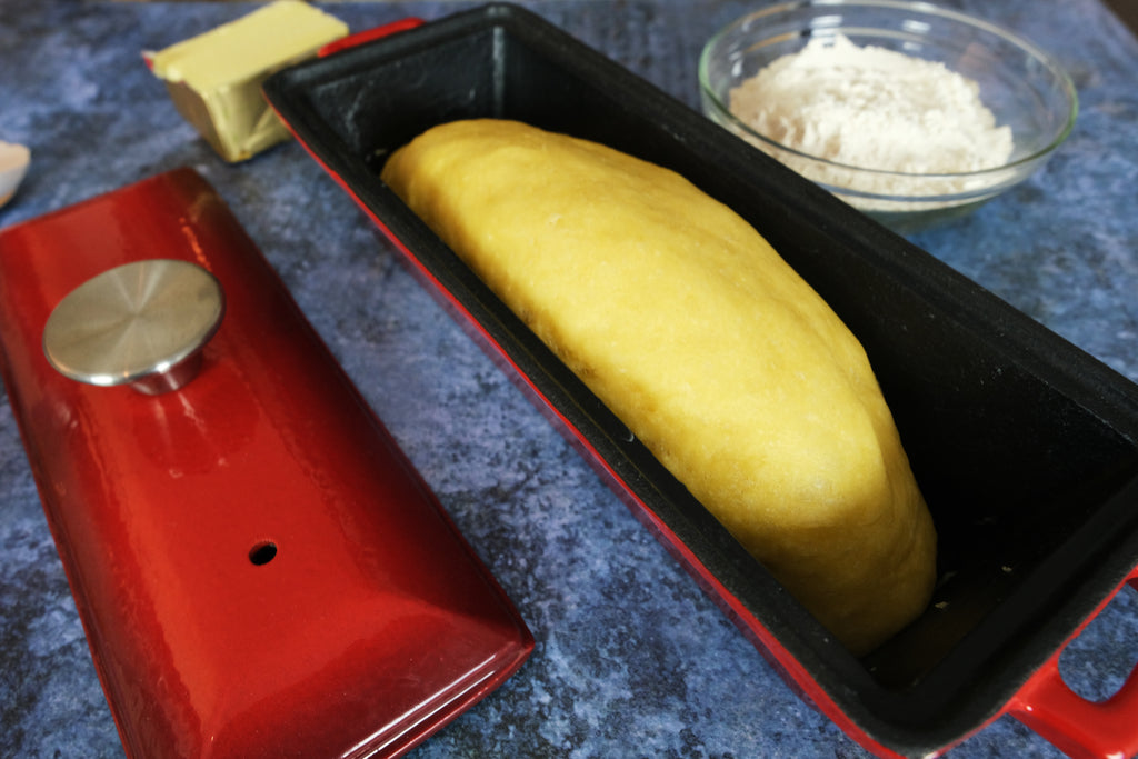 brioche in an enameled cast iron bread pan