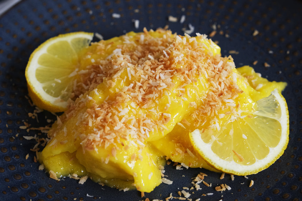 mango sorbet topped with roasted coconut flakes