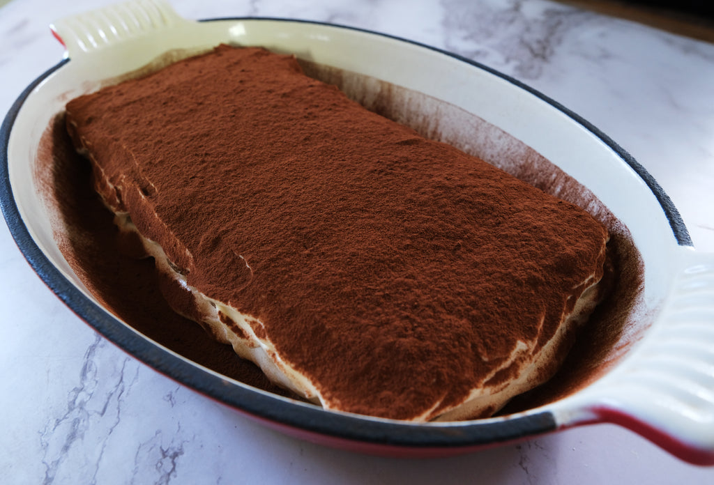 tiramisu in an enameled roasting pan