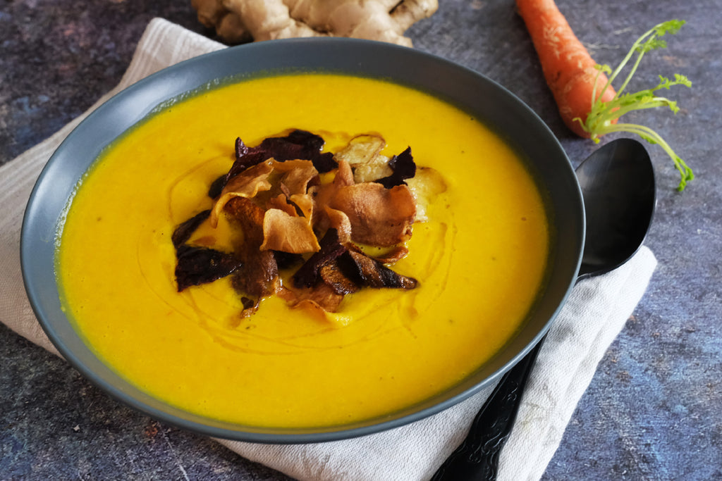 Carrot, Ginger and Coconut Soup served vertical