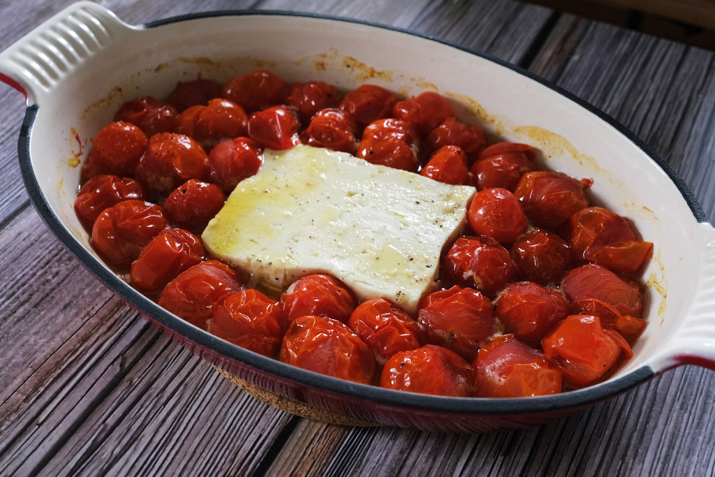 enameled cast iron roasting pan with feta and tomatoes