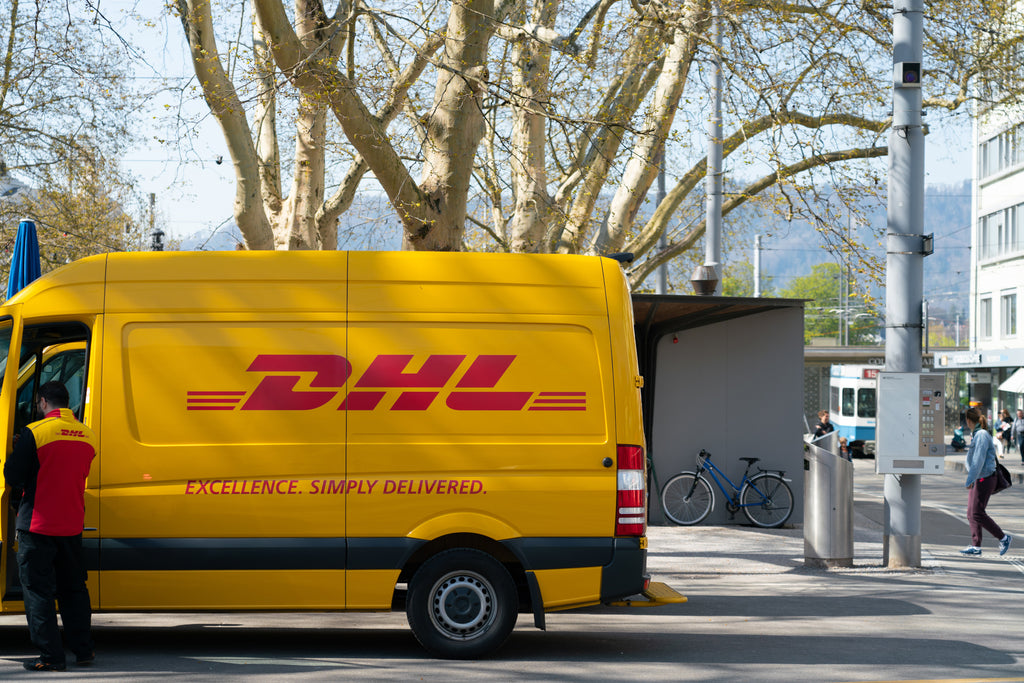 dhl truck and delivery man