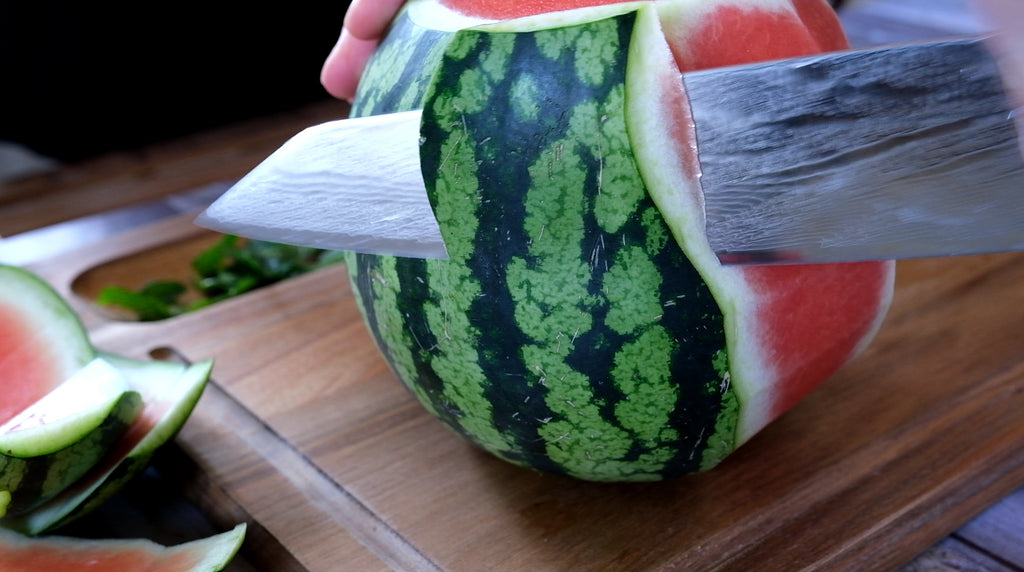 cutting melon from the side