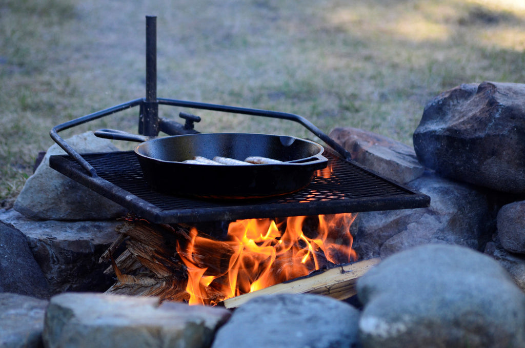 cast iron skillet cooking outdoors