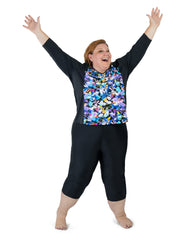 alt="Susan O'Hara of Legs Like Mine. Lipedema Awareness Month. She is wearing a plus size swim shirt and plus size swim capris from JunoActive. "