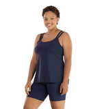 Front view of plus size woman wearing Hush collection, navy cami and boxer brief