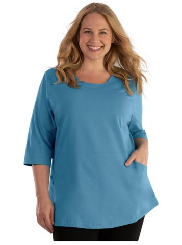 Top half of plus size woman in turquoise 3/4 sleeve JunoActive top.