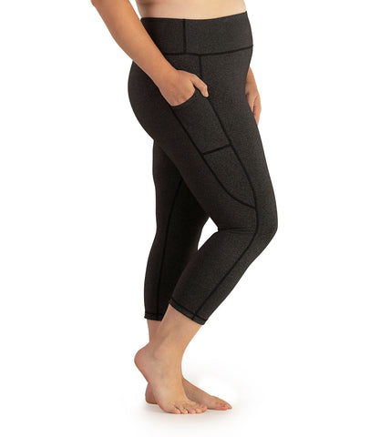 Bottom half of plus size woman wearing JunoActive heather gray side pocket legging.