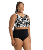 Plus size woman facing forward wearing JunoActive plus size swim bra top and plus size swim brief.
