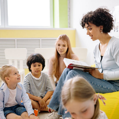 Teacher reading to children