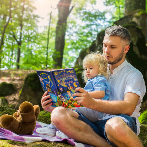 Father reading book with child
