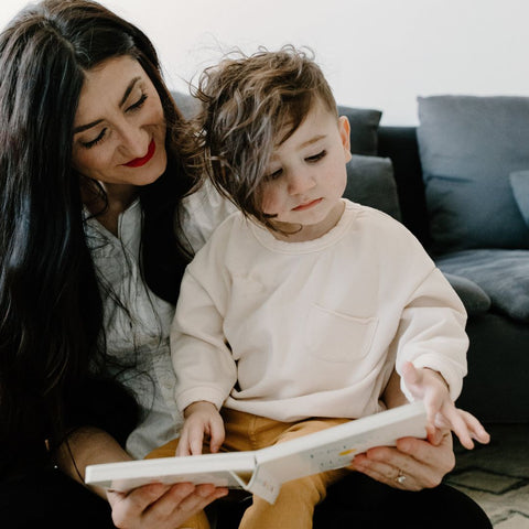 Mother reading to child