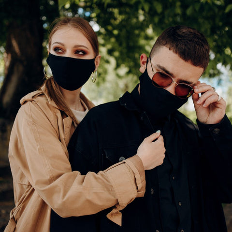 Couple wearing mask to prevent covid spread