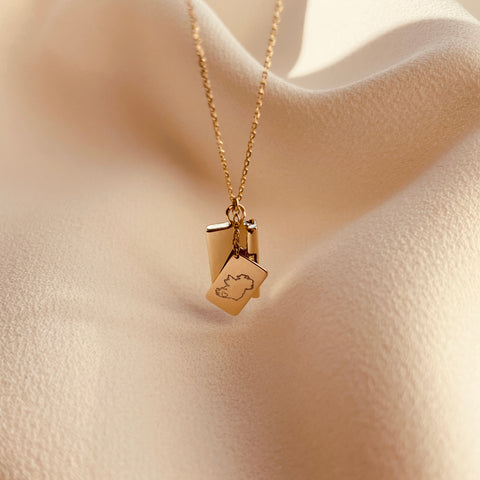 Home Is Where The Heart Is Signature Envelope Necklace 9ct Gold Heart over Cork hanging, from the back.jpg