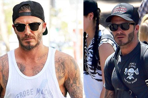 O ex jogador de futebol Beckham curte um bon preto de aba curva