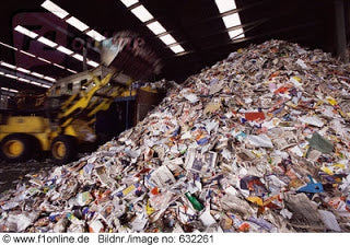 huge pile of waste paper waiting to be recycled