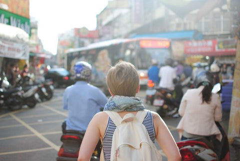 girl traveling with backpack