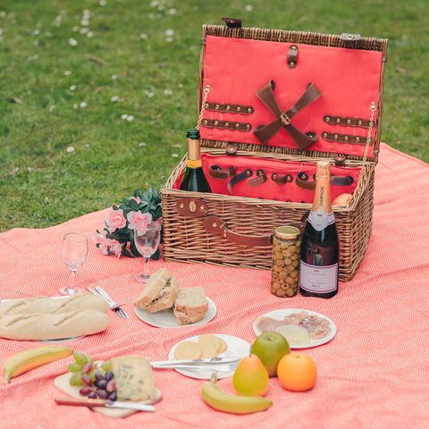 Red lined wicker picnic basket hamper