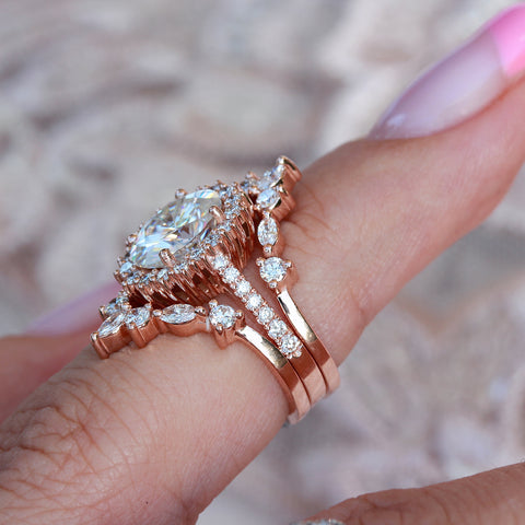 Rose gold three ring set bridal rings, oval moissanite Nia and two Hermes nesting bands