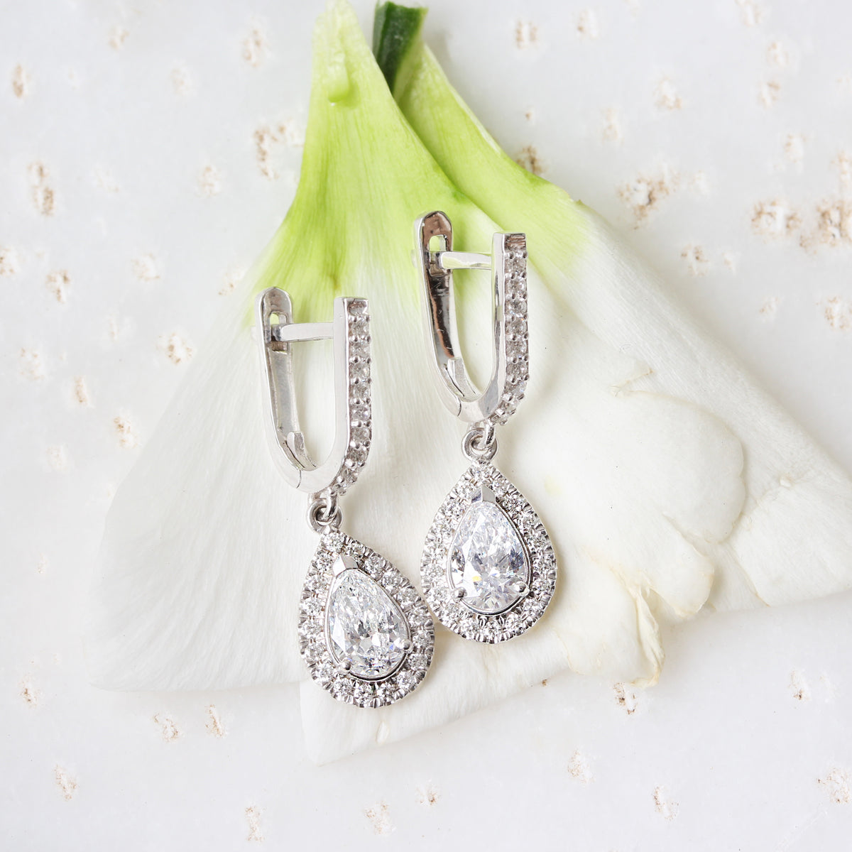 Huggie earrings pear diamond halo drop | sillyshinydiamonds