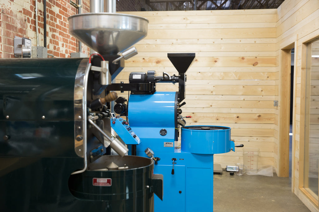 Coffee Roasters Against Brick and Wood Background