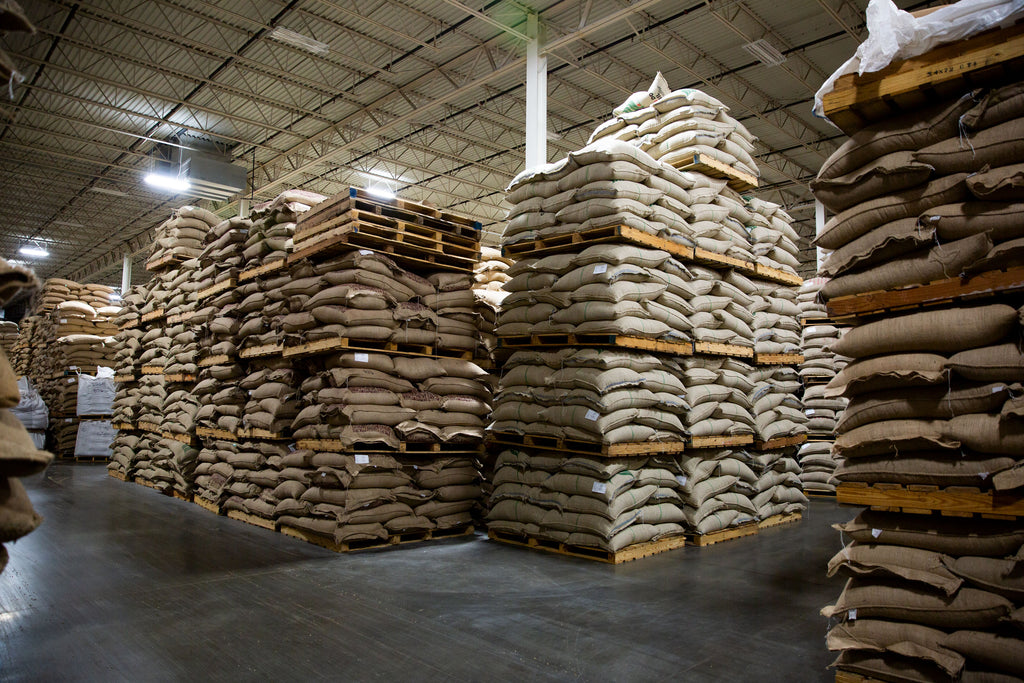 Stacks of coffee in warehouse