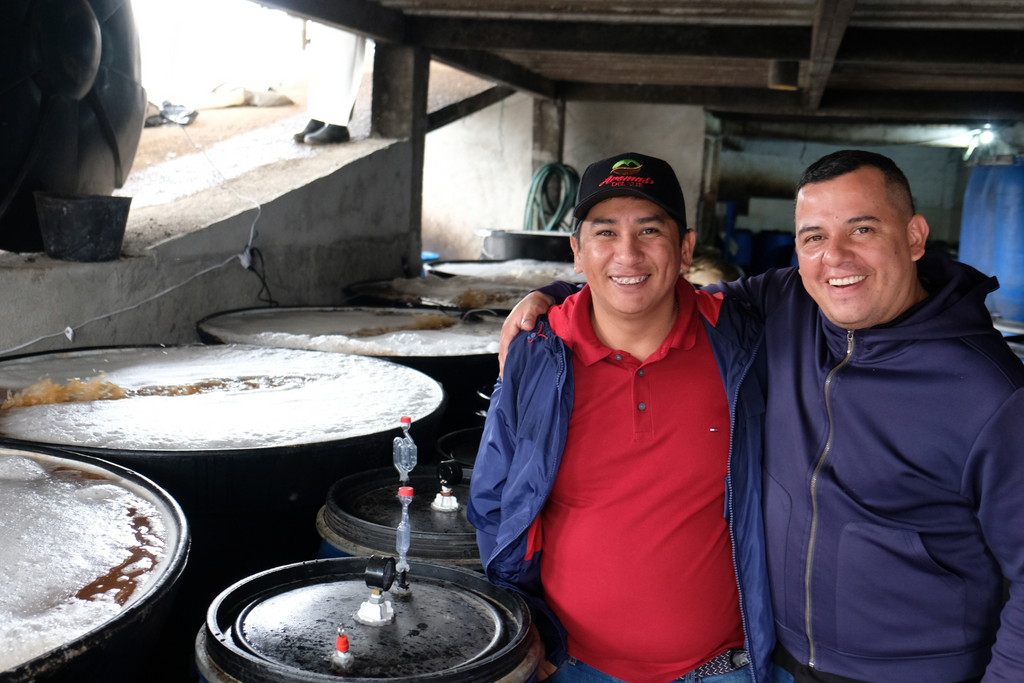 Rodrigo Sanchez (L) and Elkin Guzman (R) in the fermentation area of Finca La Loma