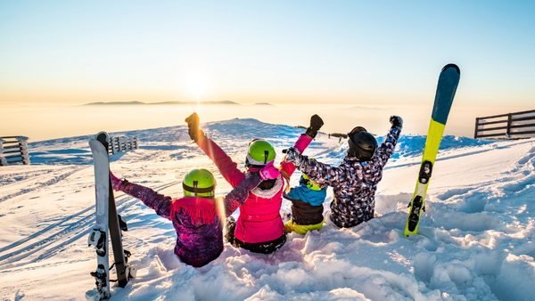 Skiers loving the view at the top