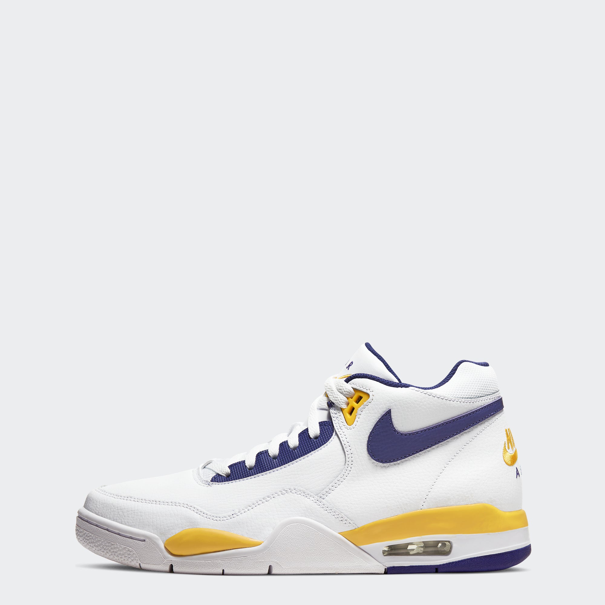 gold and purple nike shoes