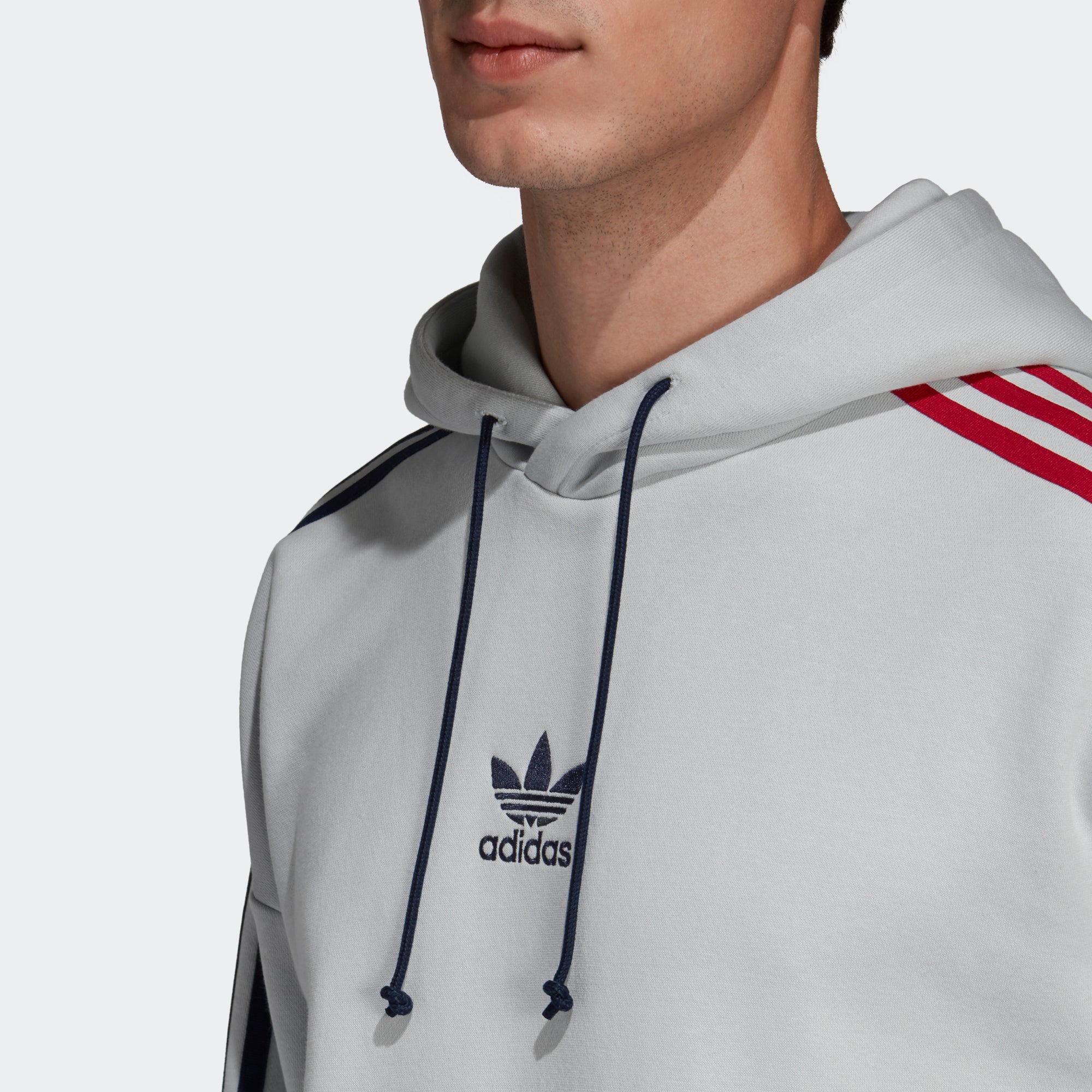 grey adidas hoodie with white stripes