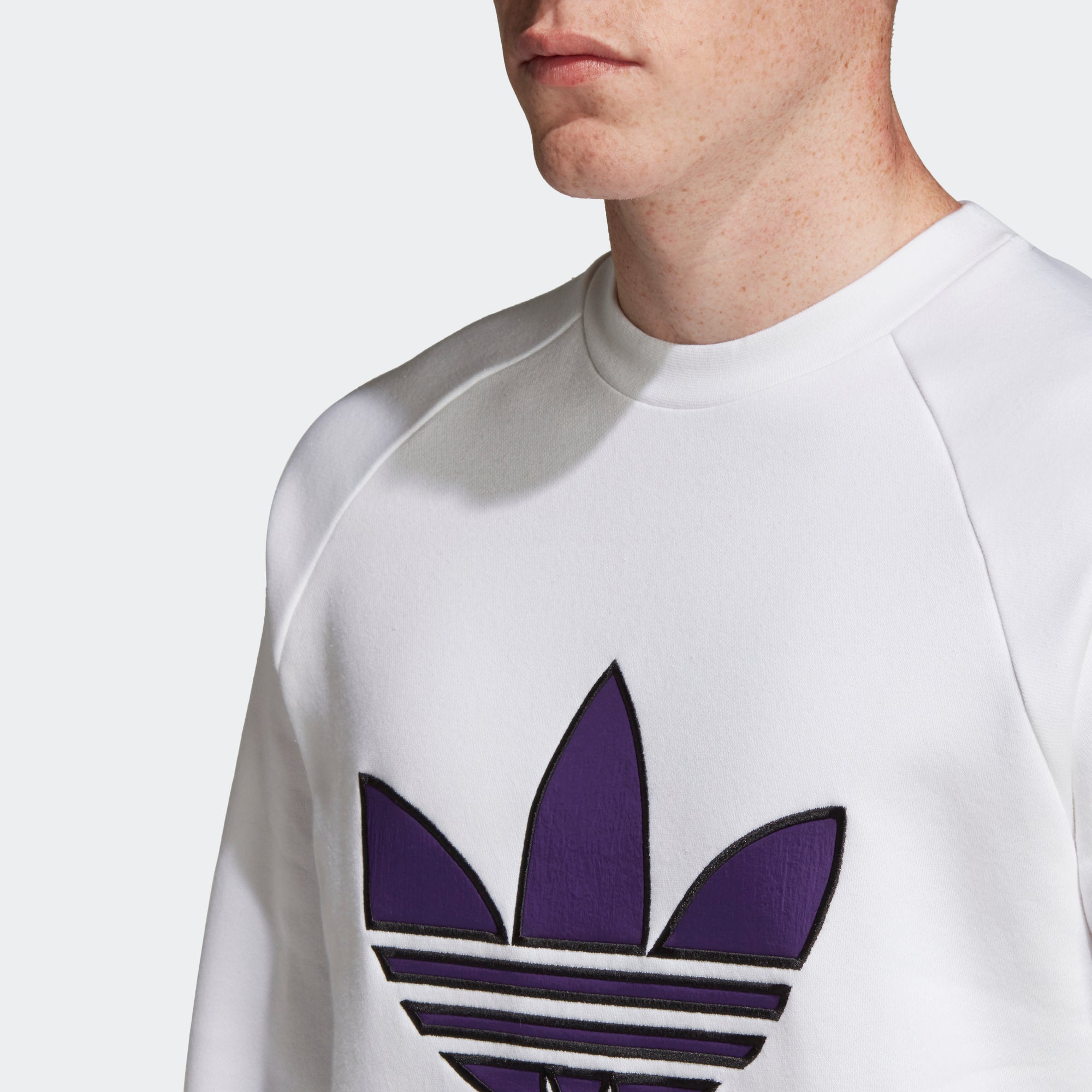 white and purple adidas shirt