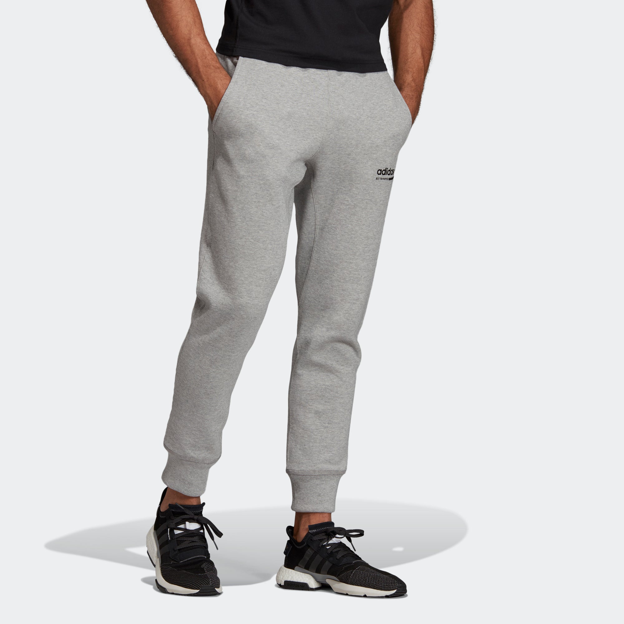grey and white adidas sweatpants