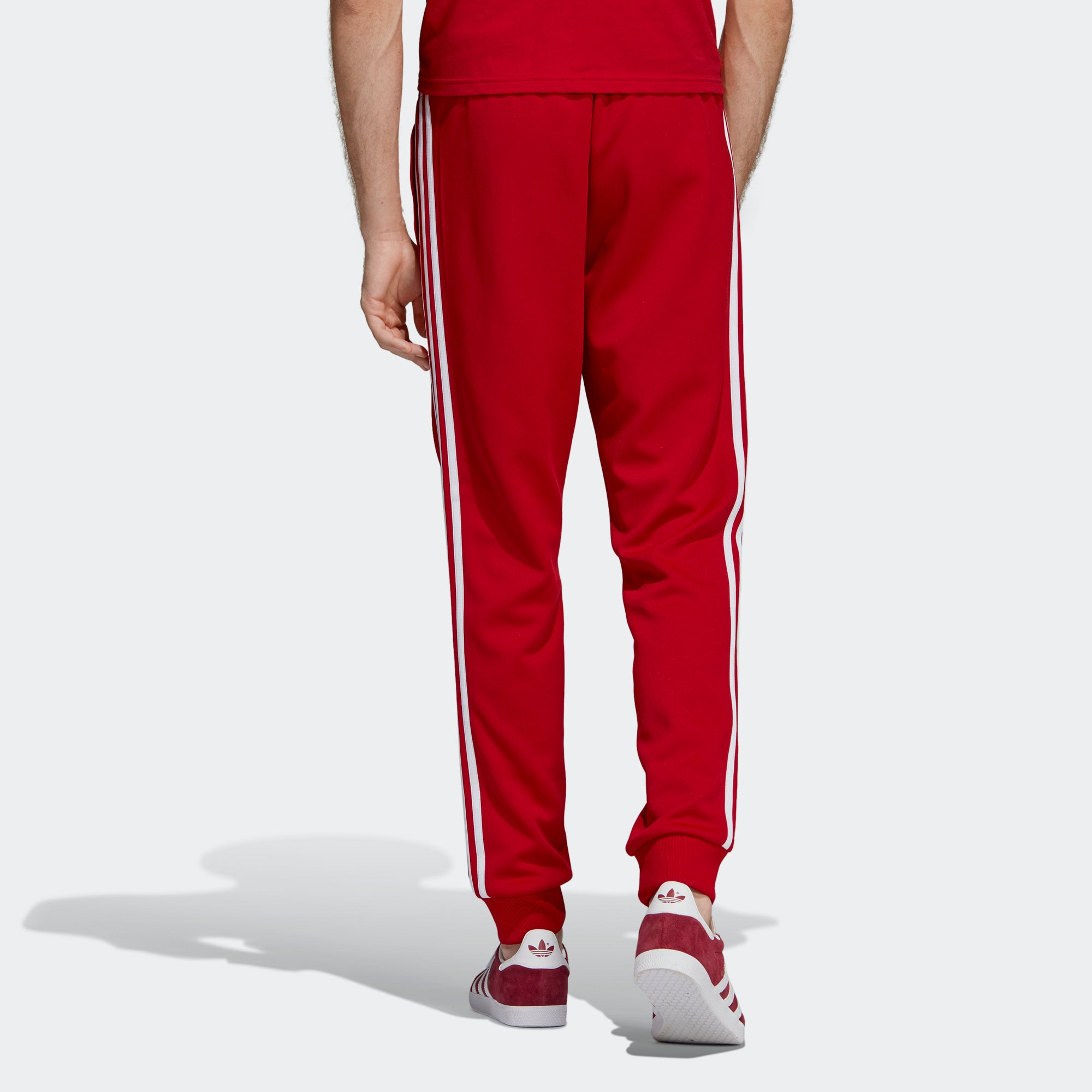 adidas sst track pants mens red