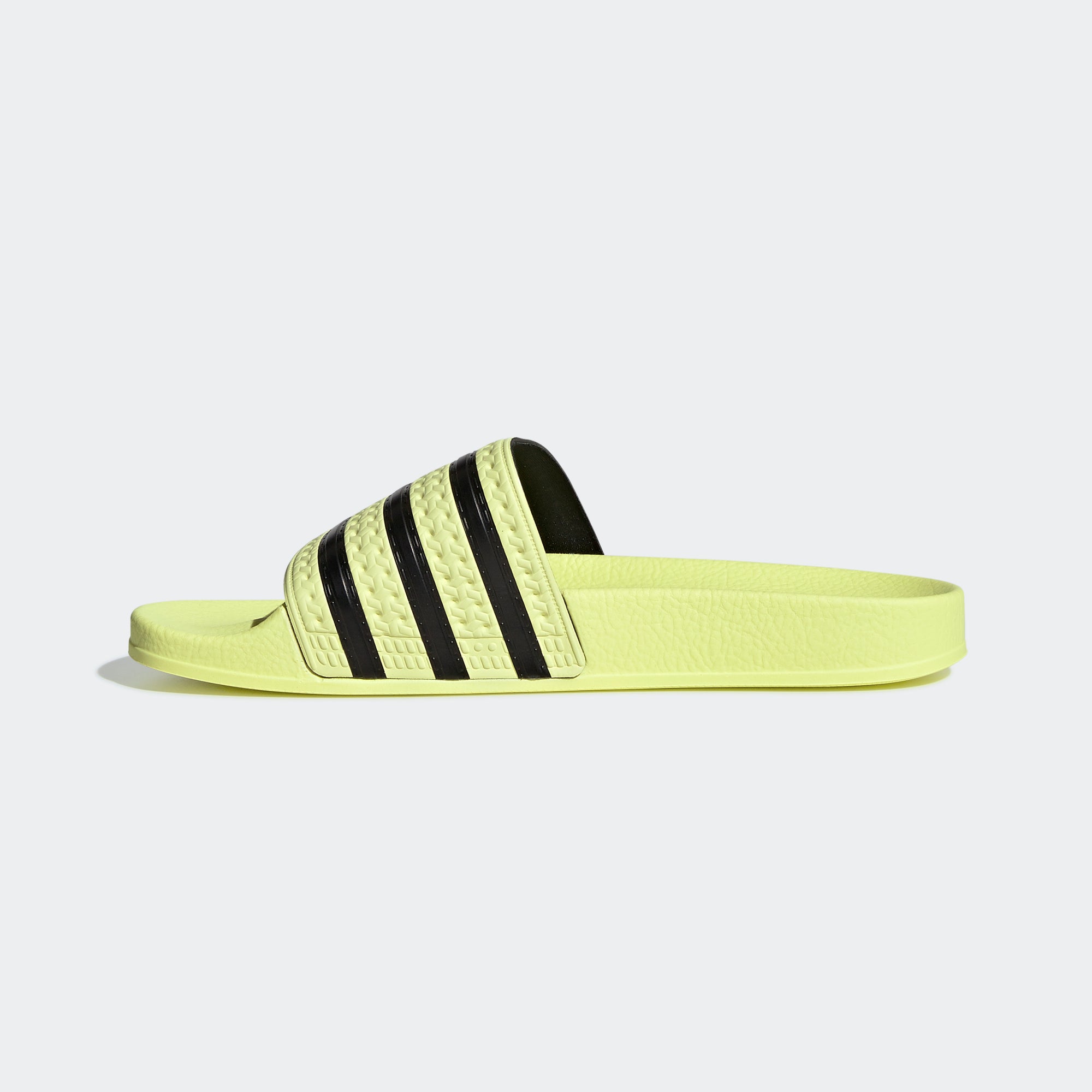 yellow adidas slides