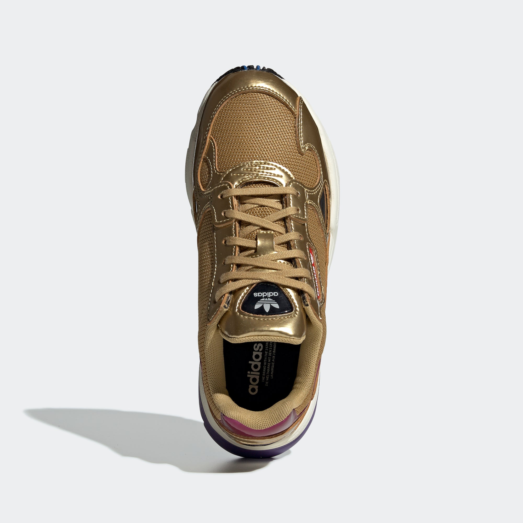 falcon shoes gold