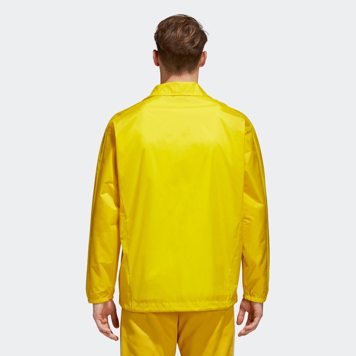 yellow adidas suit