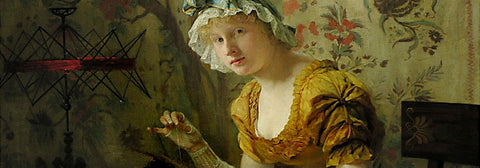 woman doing embroidery