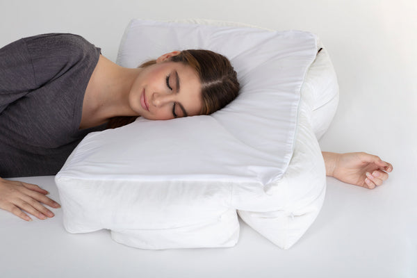 woman using husband pillow while sleeping