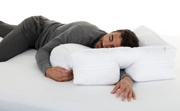 man sleeping on wife pillow