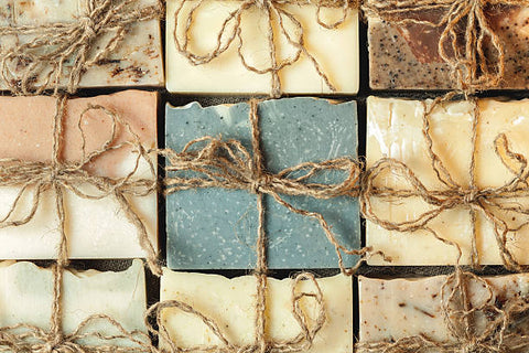 Rows of handmade soap tied with brown string