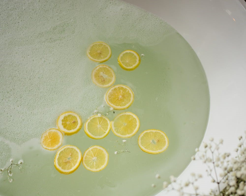 Sliced lemon in a bath.