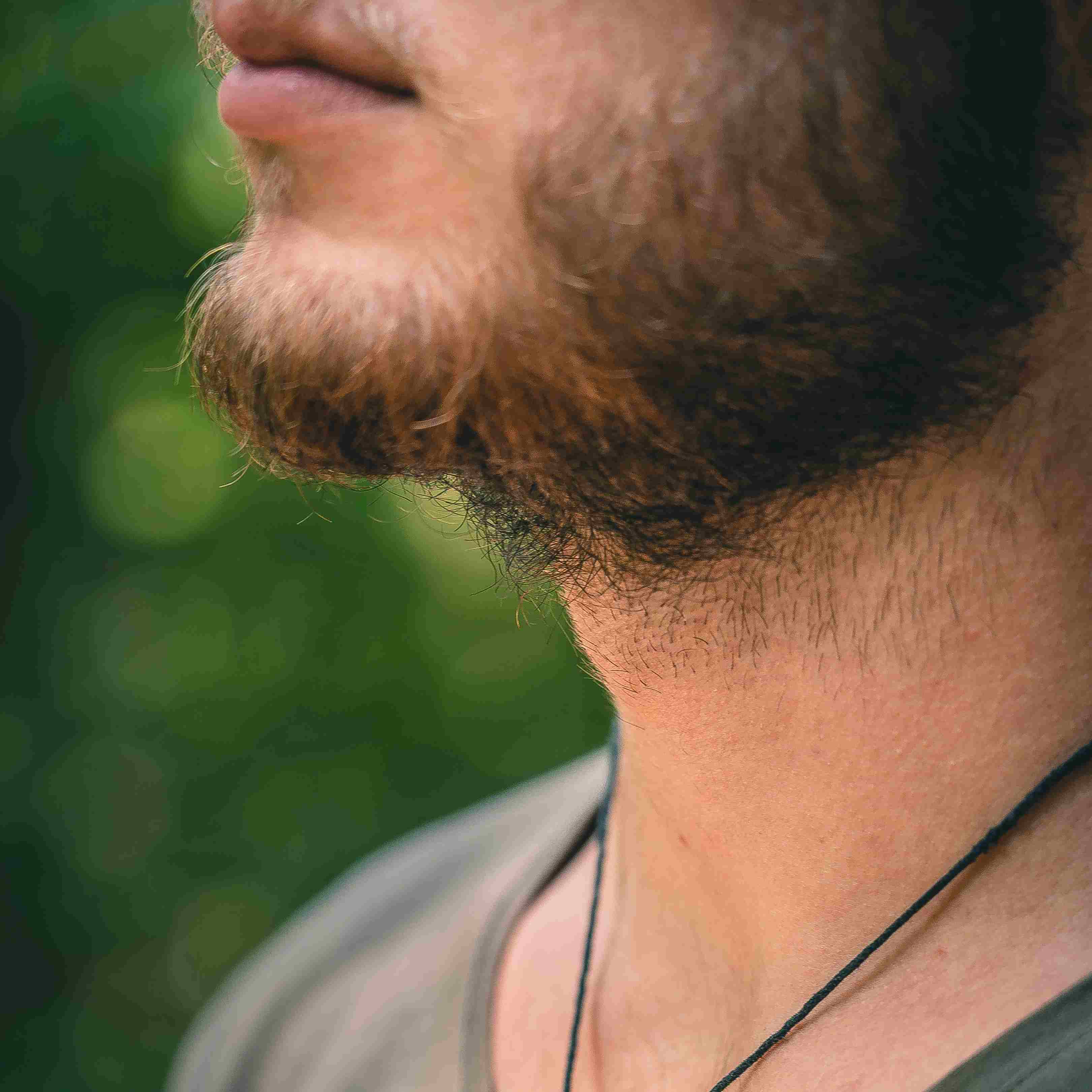 Man showing his beard.