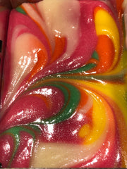 Yellow, green, pink and cream wet soap top