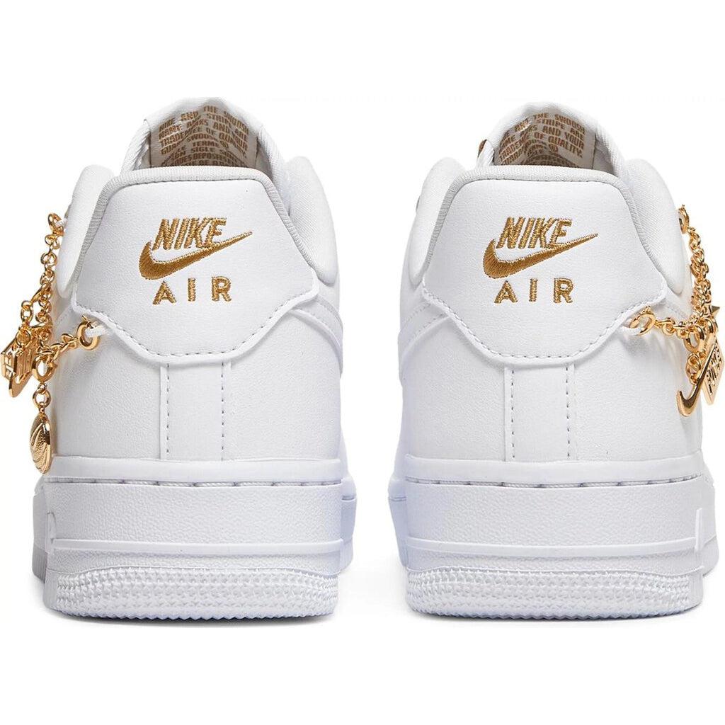 white air force ones with gold trim