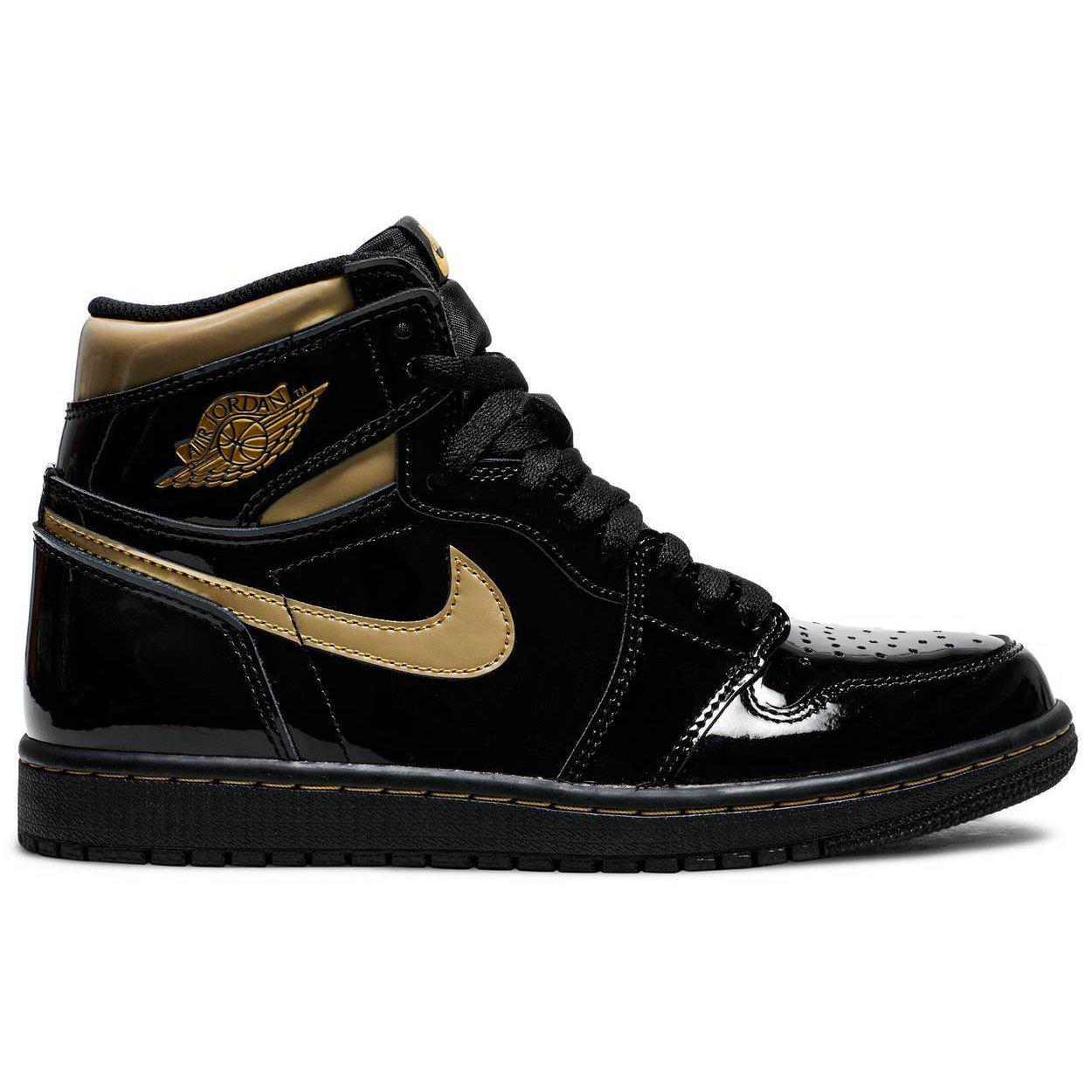 gold and black nikes