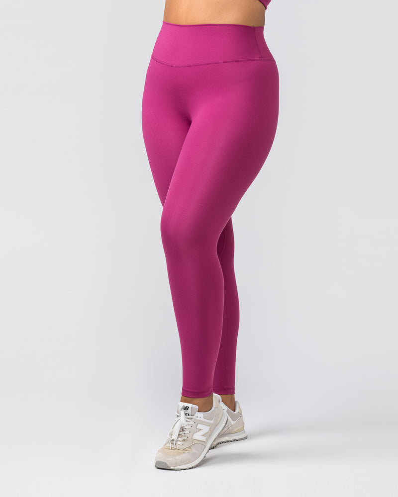 Pink gym leggings for women, ankle length sports pants, gym tights.