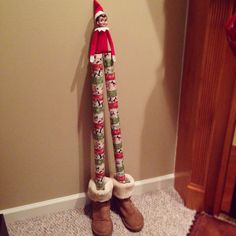 Elf on The Shelf on makeshift stilts