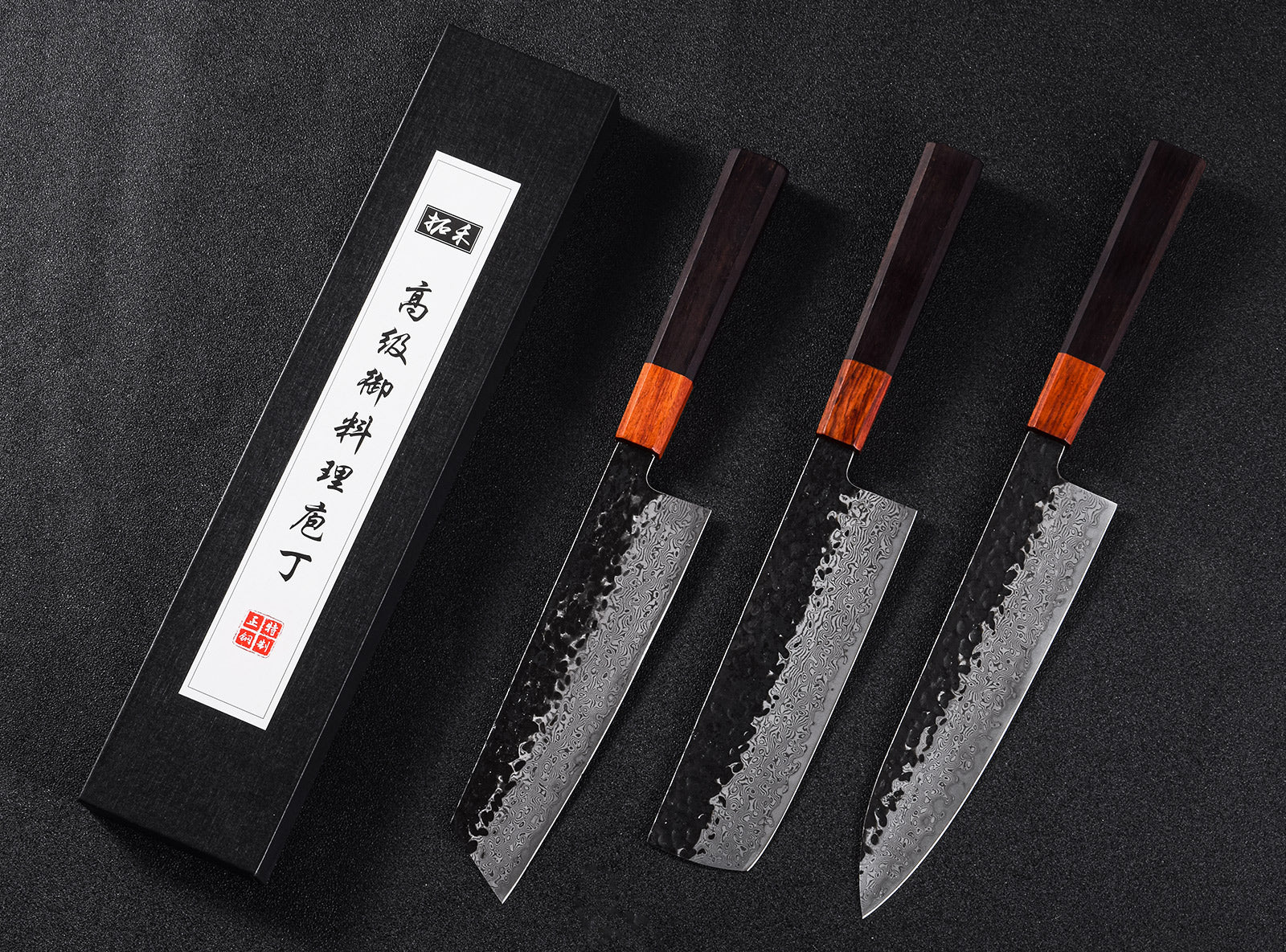 This knife shape may not seem as familiar as chef’s knives or slicers, but it’s known in Japan as a Nakiri knife, and is used for cutting vegetables. This one has 16 layers of steel over a core metal, with a hammered surface that looks stunning and helps keep foods from sticking to the blade as you work.  Unlike chef’s knives, this has a flat cutting edge, which means the entire length of the blade can make contact with the cutting surface at the same time. Because of that, it’s easier cut all the way through vegetables without leaving them attached to each other where the cut wasn’t finished.  While this is hand made in Japan and each is a one-of-a-kind creation, the handle is Western style and made from beautiful mahogany, so it will feel familiar and comfortable. This should be hand washed and dried, particularly if it’s used with acidic ingredients.