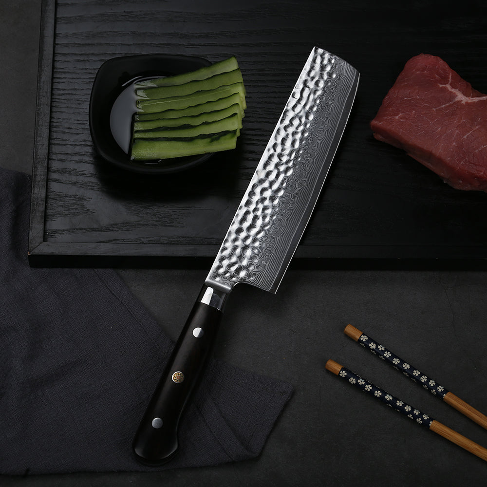 SUPERIOR STEEL - Manufactured with an ultra-sharp and cryogenically treated steel cutting core at HRC 56-58 hardness, this 7 in. Japanese style Nakiri vegetable knife boasts unrivaled performance and incredible edge retention. ERGONOMIC & WELL-BALANCED - Ergonomically designed, the narrow and slightly curved blade helps alleviate fatigue and finger pains from long periods of slicing or chopping, perfectly blending performance and comfort