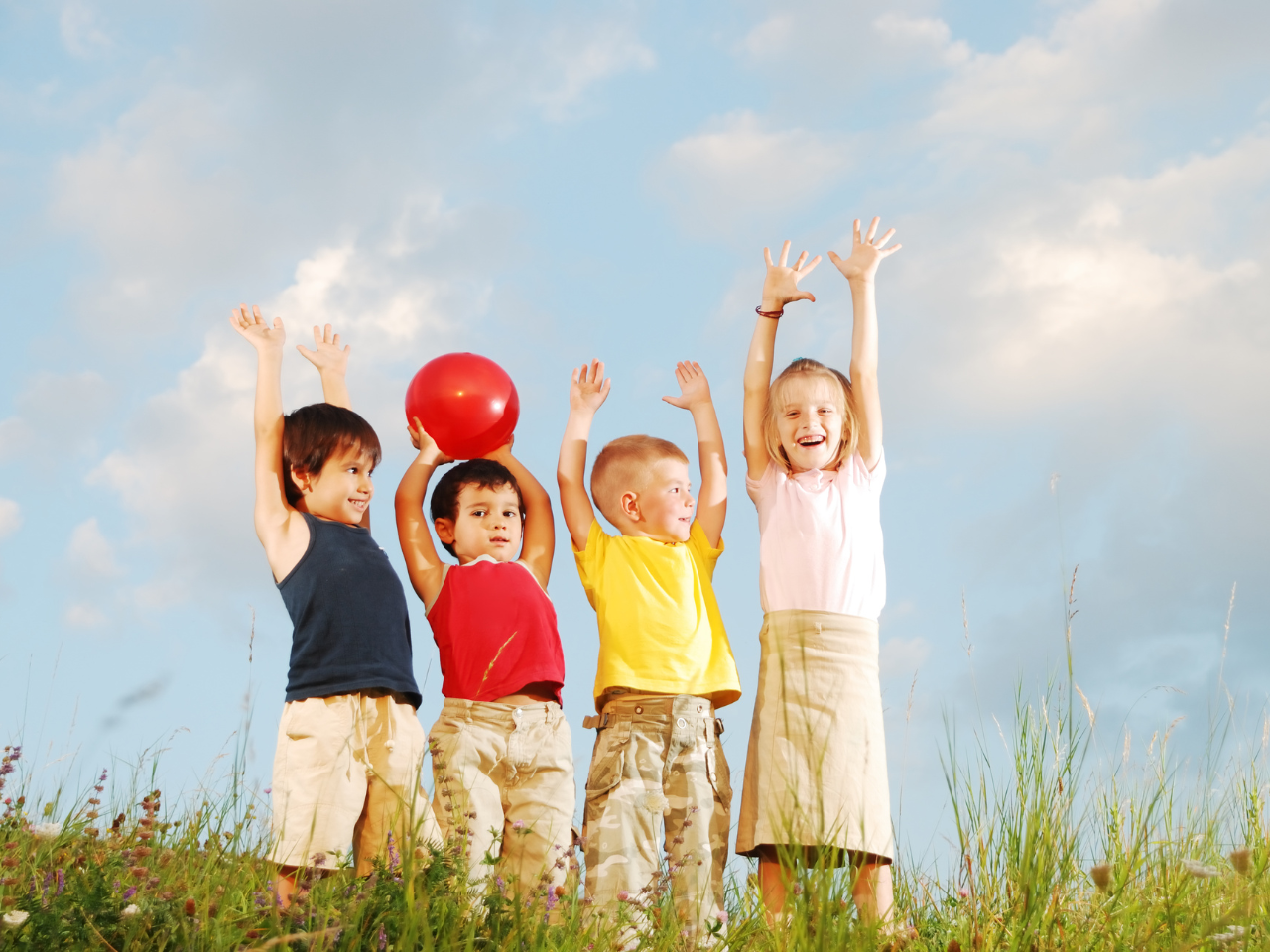 A group of happy children in the field